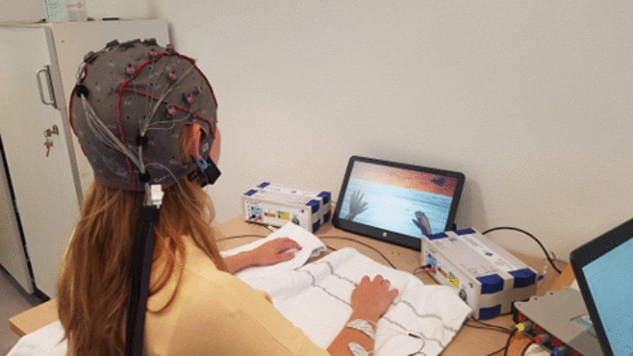 Brain computer interface training with motor imagery and functional electrical stimulation for patients with severe upper limb paresis after stroke: a randomized controlled pilot trial