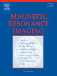 Frequency and phase correction of GABA-edited magnetic resonance spectroscopy using complex-valued convolutional neural networks